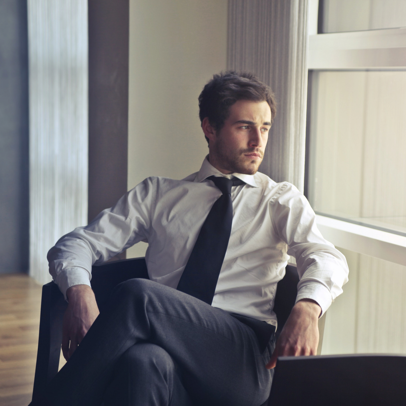 man-wearing-white-dress-shirt-and-black-necktie-716411